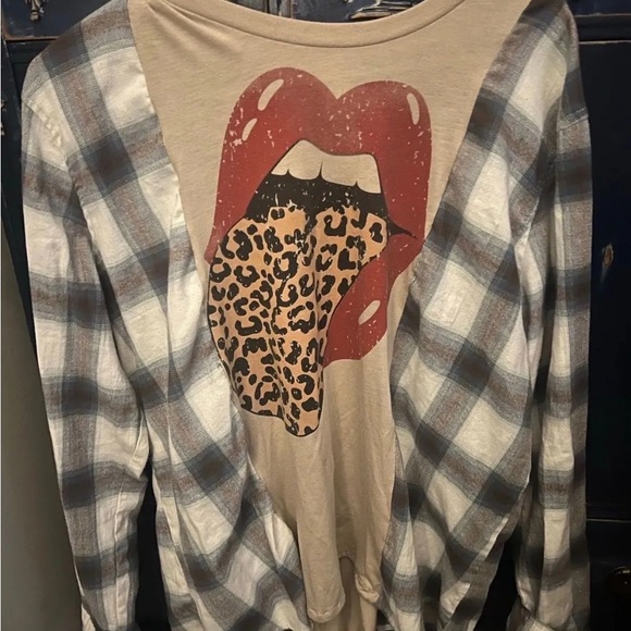 Reworked
Upcycled Rolling Stones
Flannel band tee - Picture 2 of 2